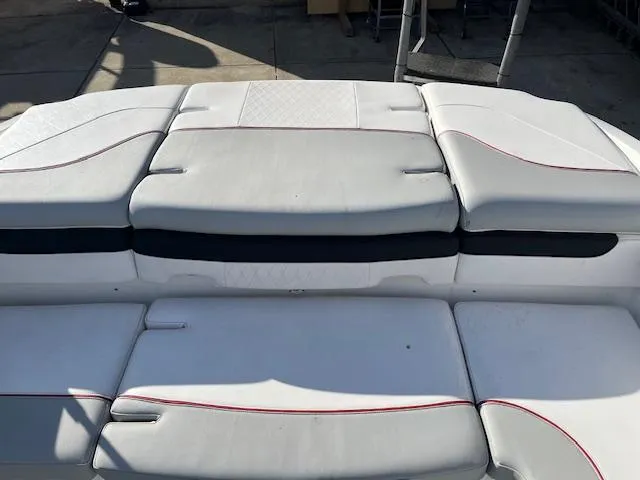 Slide: The Image of 2023 Tahoe 210 Si boat interior with white cushioned seating. - 3