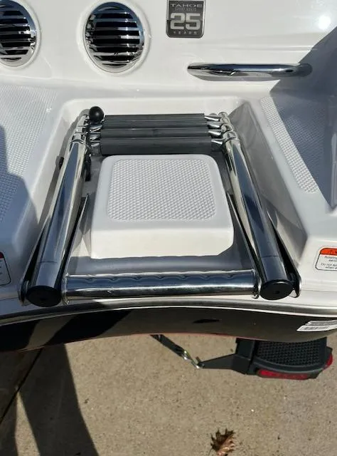 Slide: The Image of 2023 Tahoe 210 Si boat ladder and deck detail. - 5