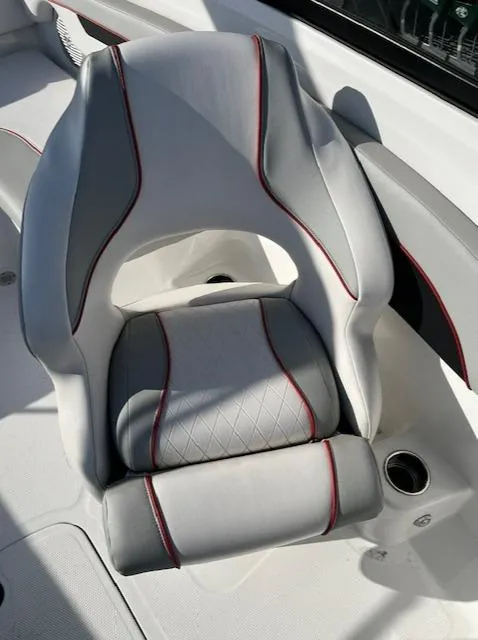 Slide: The Image of 2023 Tahoe 210 Si boat seat with gray and red accents. - 6