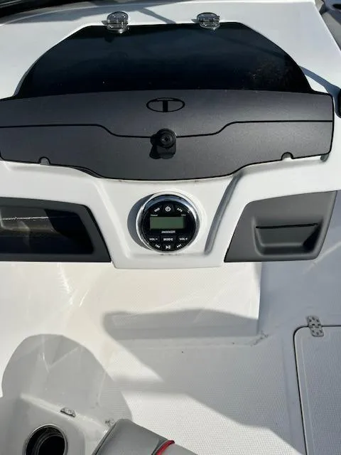 Slide: The Image of Dashboard of 2023 Tahoe 210 Si boat with modern controls and sleek design. - 7