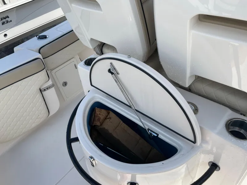 Slide: The Image of 2023 Sea Chaser 27 HFC boat interior with open storage compartment. - 15