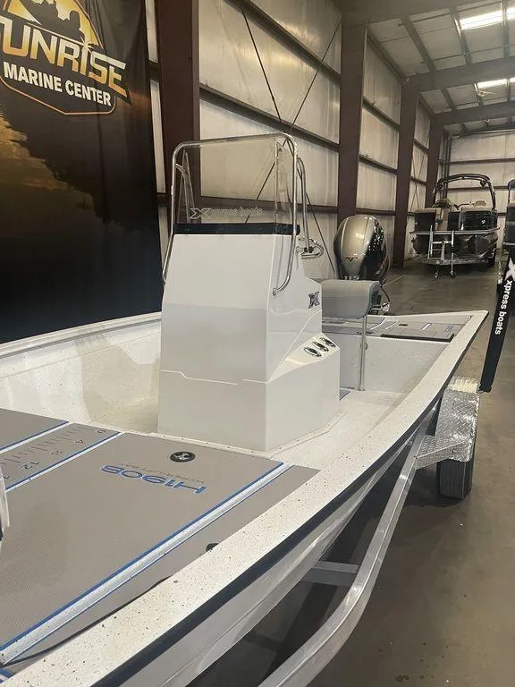 Slide: The Image of 2023 Xpress H190B boat at Sunrise Marine Center. - 11