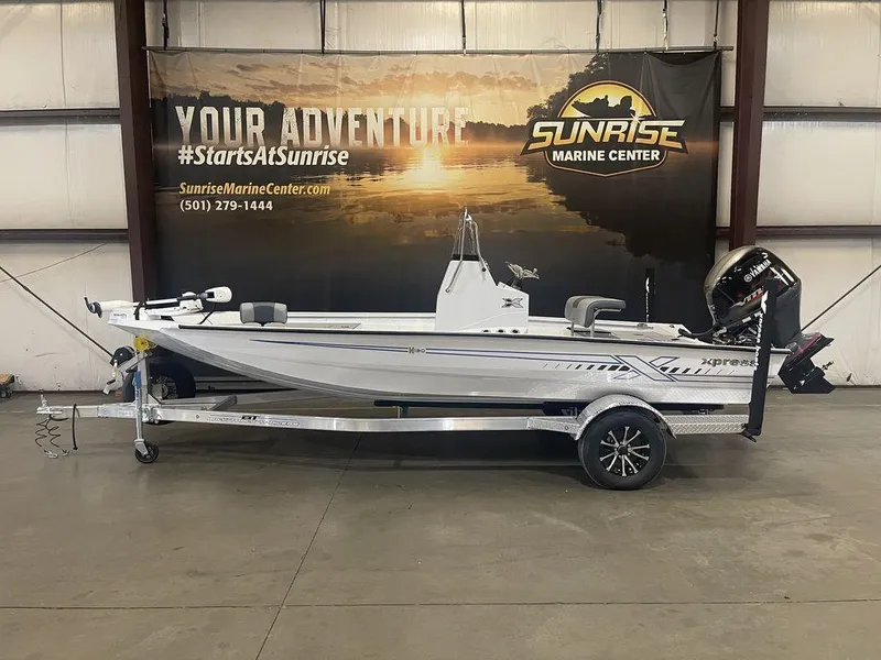 Slide: The Image of 2023 Xpress H190B boat at Sunrise Marine Center showroom. - 21