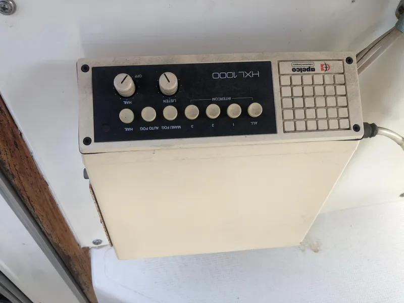 Slide: The Image of Vintage 1986 Cruisers ESPRIT 3370 boat control panel, featuring a Datamarine HXL 1000 unit. - 8