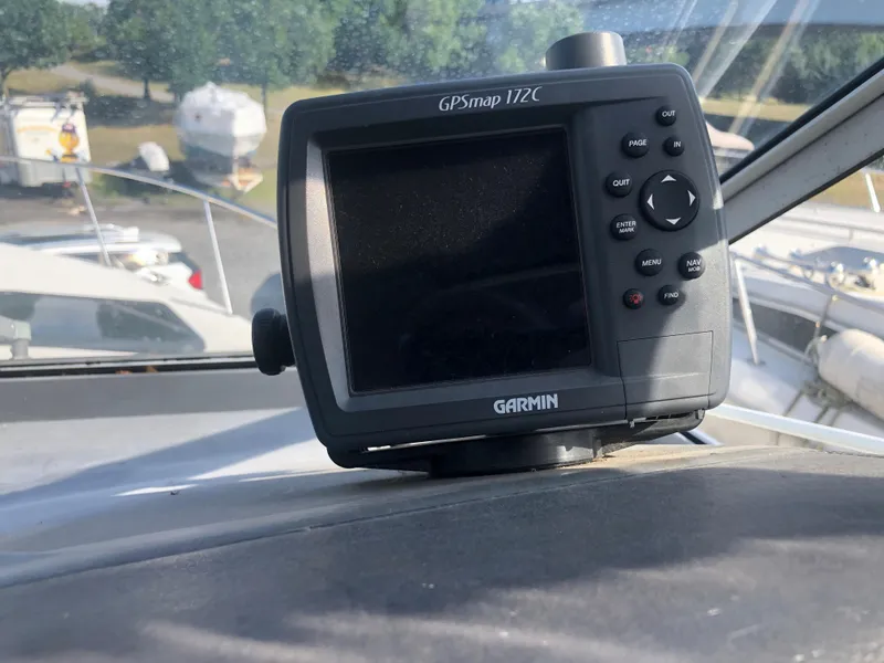 Slide: The Image of Garmin GPSmap 172C on 1986 Cruisers ESPRIT 3370 boat dashboard. - 3