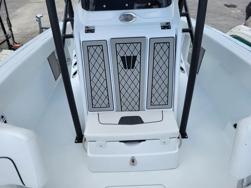 Slide: The Image of 2023 Wellcraft 222 Fisherman boat interior with storage compartments. - 5