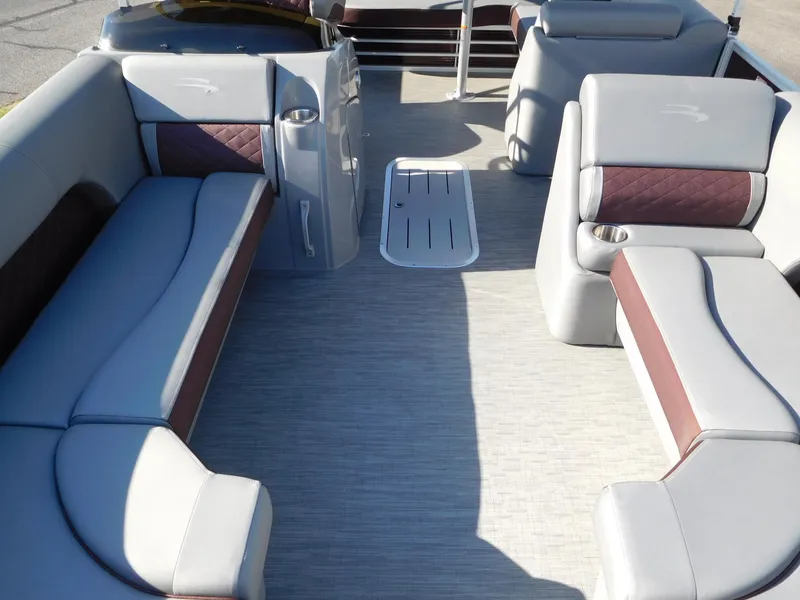 Slide: The Image of 2023 Bennington 22 LSB pontoon boat interior with spacious seating and modern design. - 5