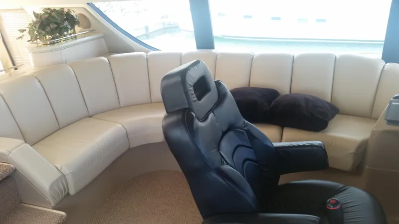 Slide: The Image of Luxurious interior of 1999 Carver 530 Voyager Pilothouse with leather seating. - 10