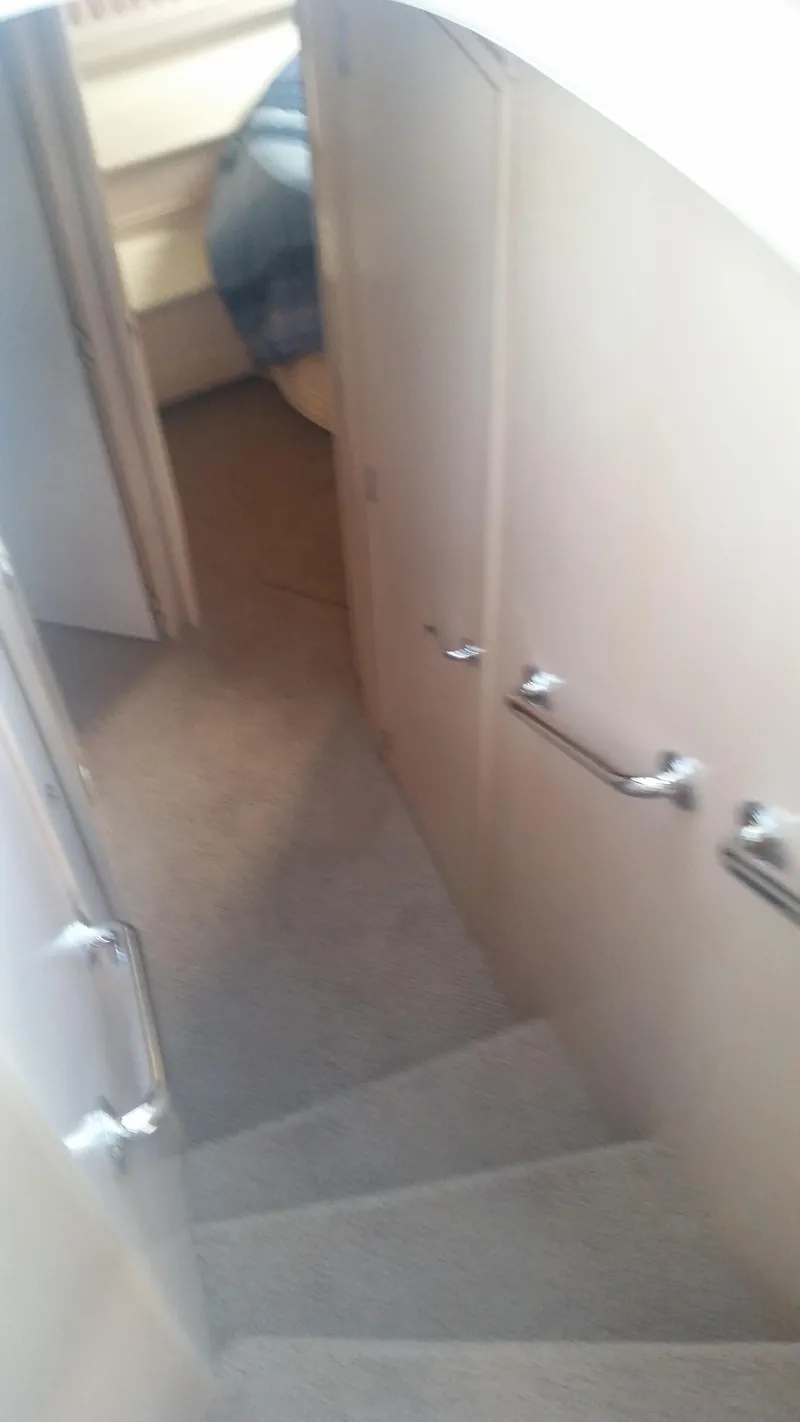 Slide: The Image of Staircase inside 1999 Carver 530 Voyager Pilothouse yacht. - 28