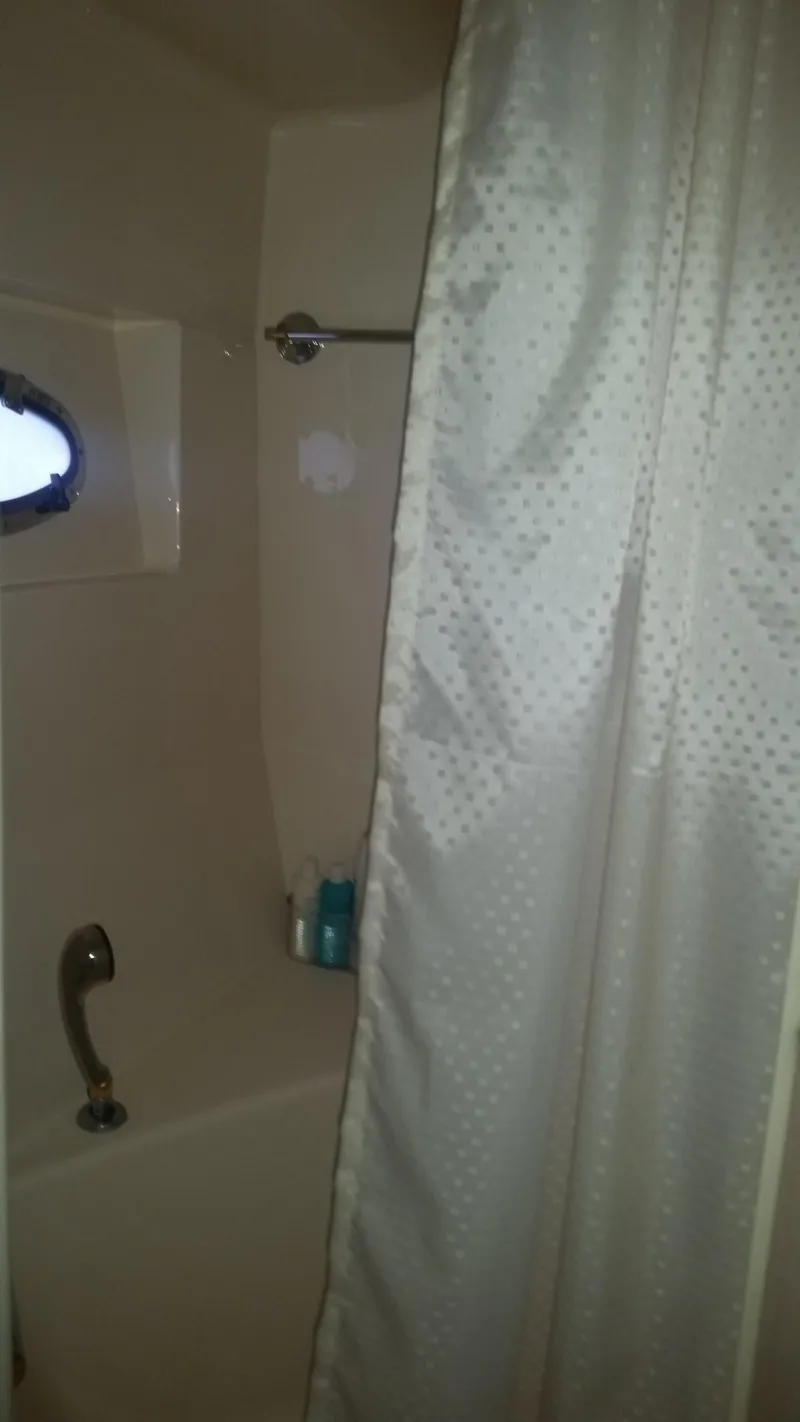 Slide: The Image of Bathroom shower area in a 1999 Carver 530 Voyager Pilothouse yacht. - 33