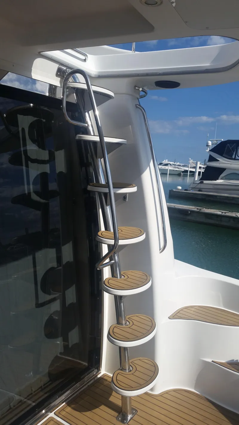 Slide: The Image of Spiral staircase on a 1999 Carver 530 Voyager Pilothouse yacht. - 4
