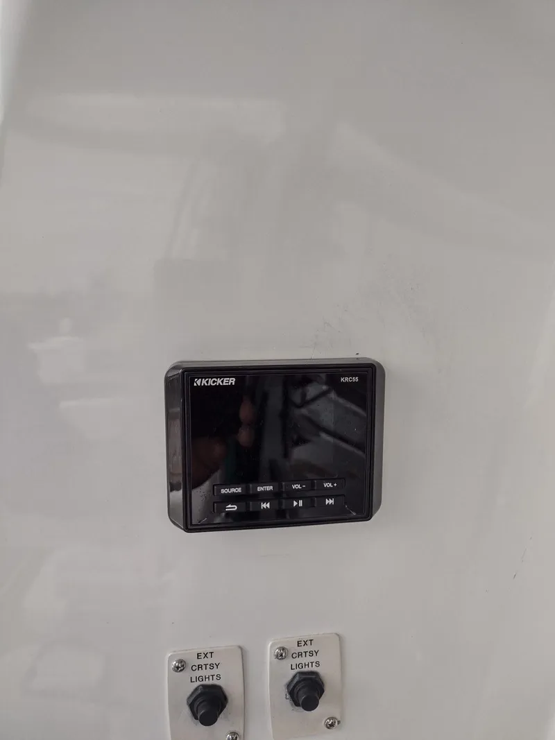 Slide: The Image of Kicker audio control panel on a 1999 Carver 530 Voyager Pilothouse. - 17