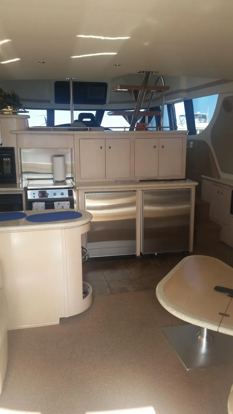 Slide: The Image of Interior of 1999 Carver 530 Voyager Pilothouse yacht with modern kitchen. - 22