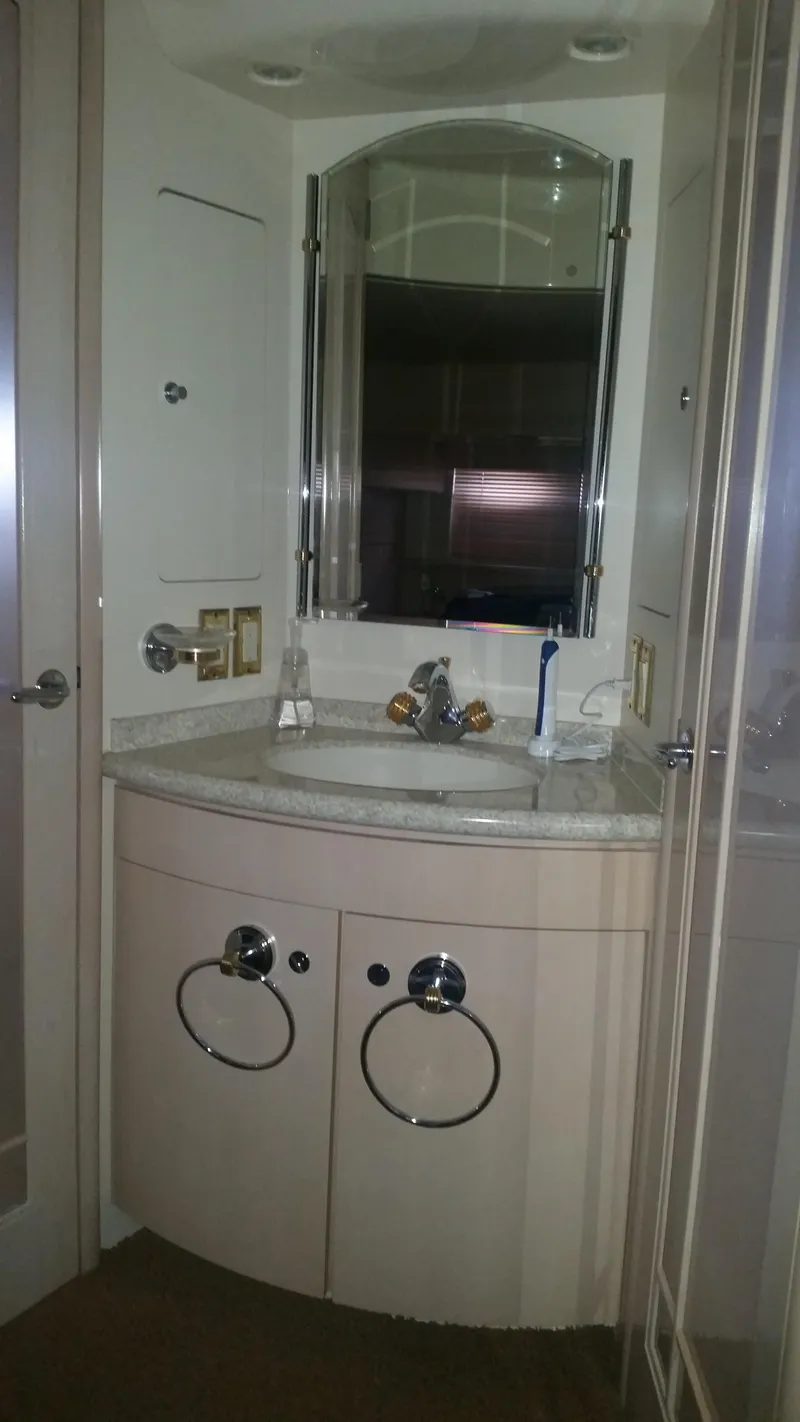 Slide: The Image of Bathroom vanity in a 1999 Carver 530 Voyager Pilothouse yacht. - 34