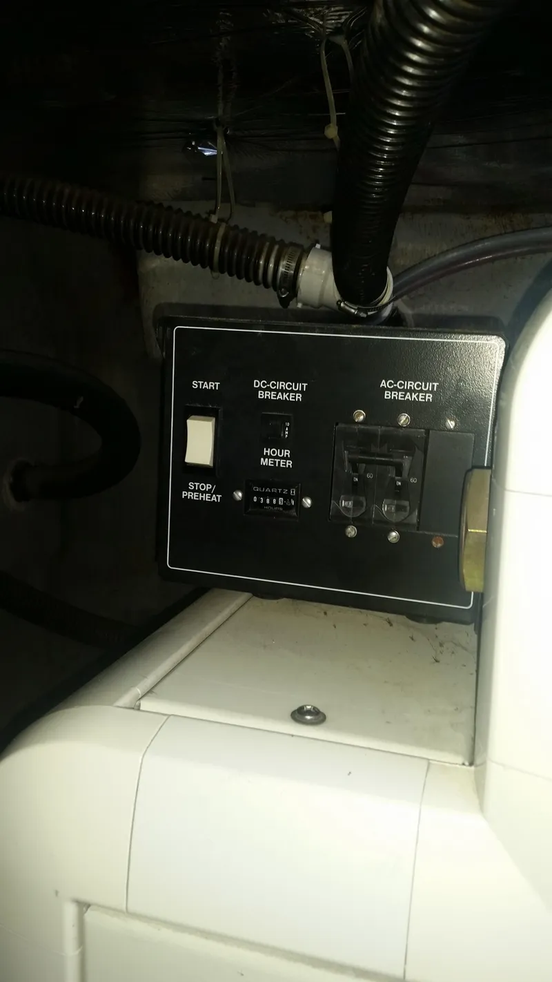 Slide: The Image of Control panel of a 1999 Carver 530 Voyager Pilothouse boat. - 43