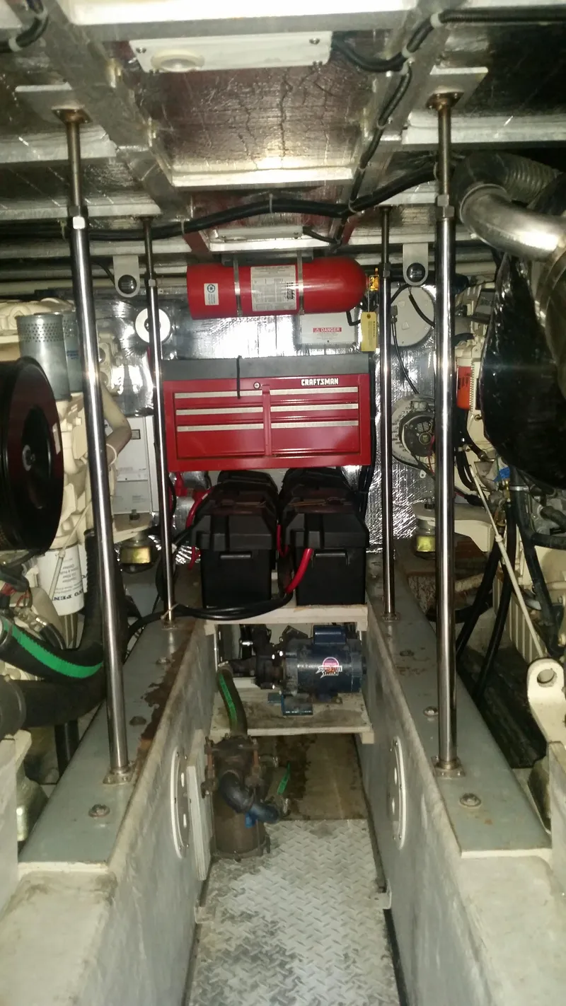 Slide: The Image of Engine room of a 1999 Carver 530 Voyager Pilothouse yacht. - 44