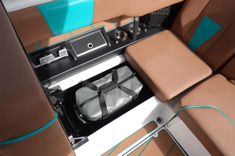 Slide: The Image of Interior of 2023 Malibu Wakesetter 23 LSV with storage and seating. - 22