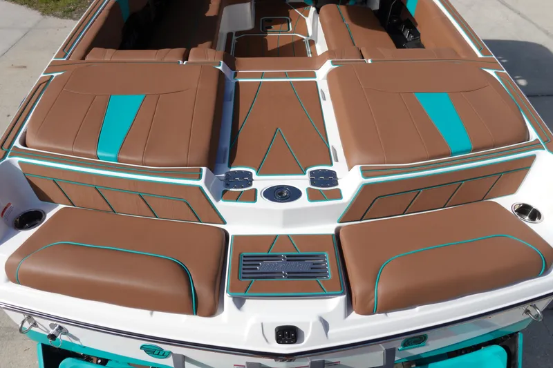 Slide: The Image of 2023 Malibu Wakesetter 23 LSV, brown and turquoise interior, rear view. - 9