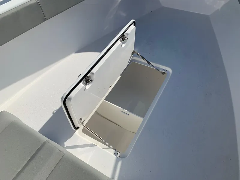 Slide: The Image of 2024 Cape Horn 31T boat storage compartment open. - 14