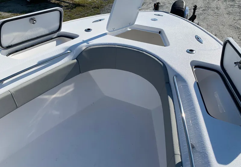 Slide: The Image of 2024 Cape Horn 31T boat interior with open storage compartments. - 15