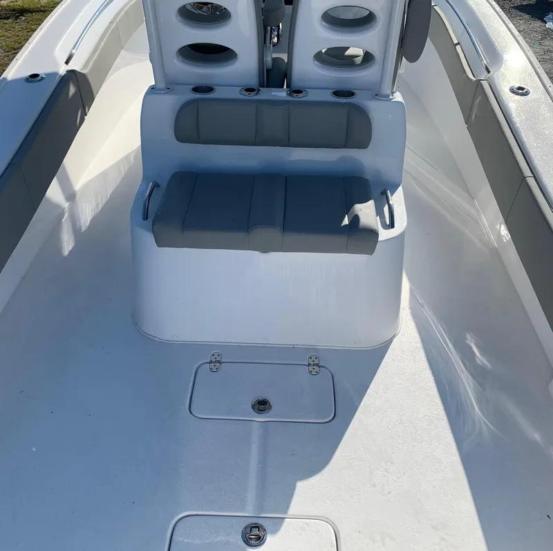Slide: The Image of 2024 Cape Horn 31T boat interior with seating and storage compartments. - 6