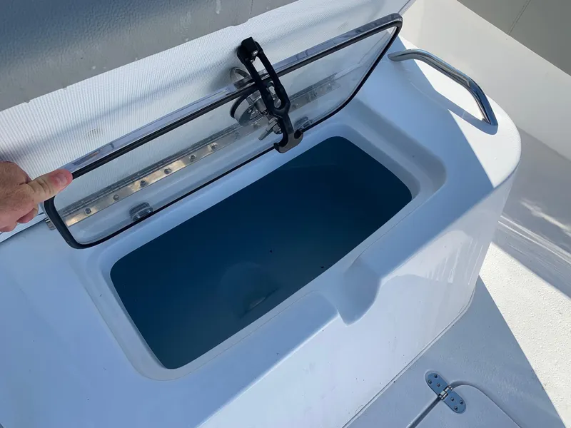 Slide: The Image of 2024 Cape Horn 31T livewell with open lid. - 8