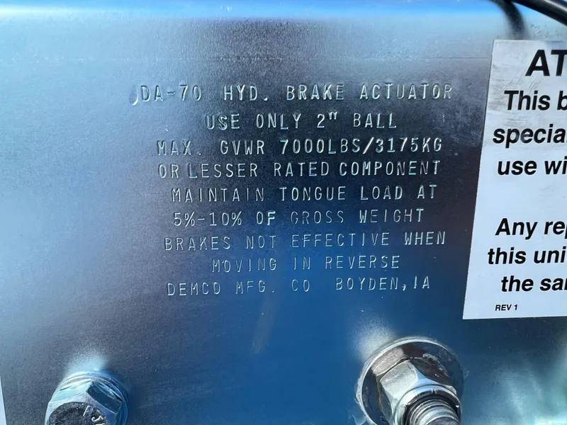 Slide: The Image of 2023 Trailer model TRAILERS DA-70 hydraulic brake actuator specifications and instructions. - 12