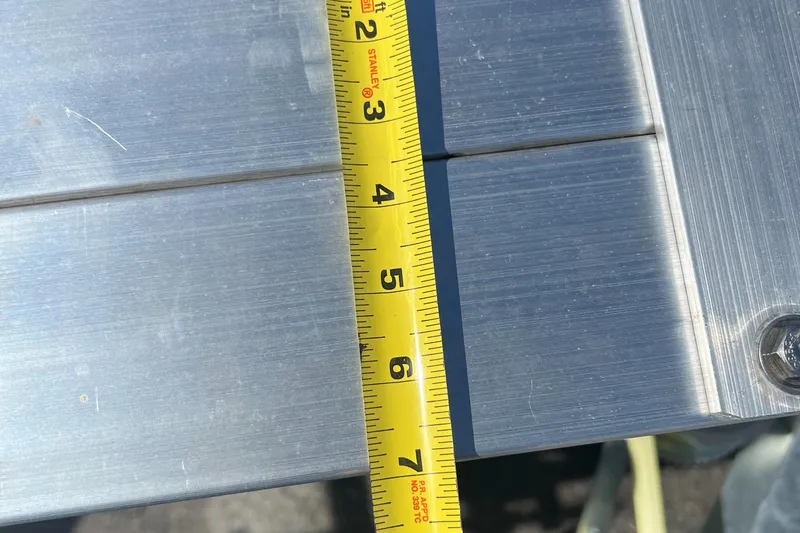 Slide: The Image of Measuring tape on 2023 Trailer TRAILERS model metal surface. - 26