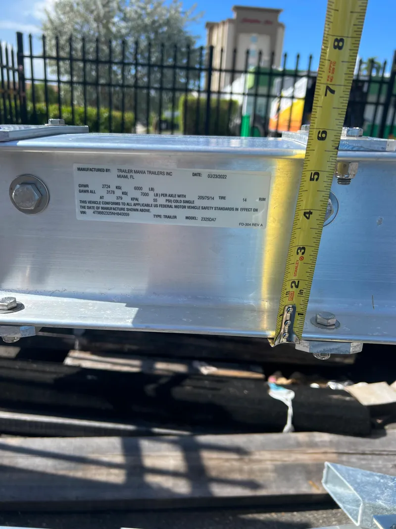 Slide: The Image of 2023 Trailer TRAILERS model with measurement tape for size reference. - 3