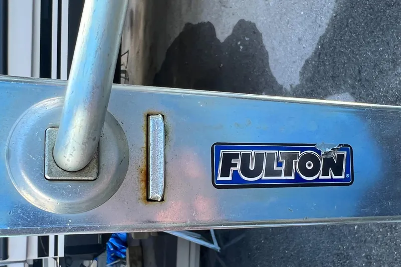 Slide: The Image of 2023 Trailer model with Fulton branding on metal component. - 30