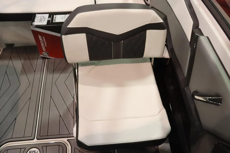Slide: The Image of Captain's chair in 2023 Monterey 238 Super Sport boat, featuring modern design and comfortable seating. - 10