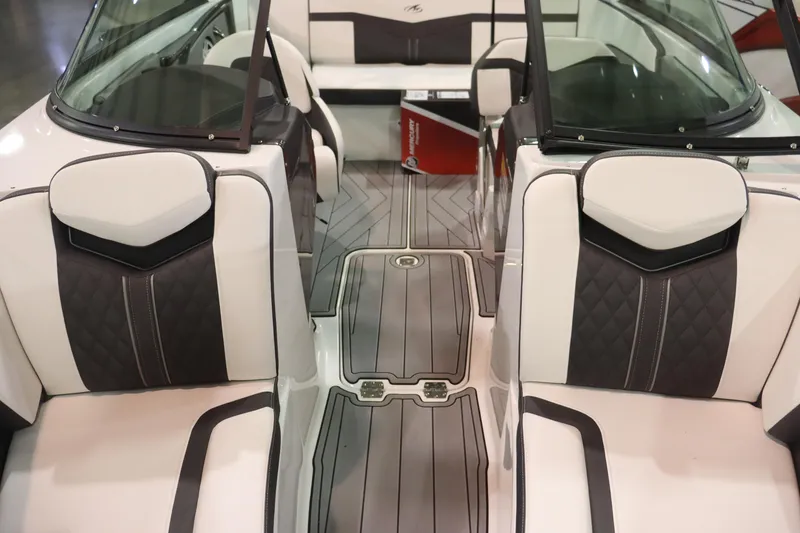 Slide: The Image of 2023 Monterey 238 Super Sport boat interior with white and black seating. - 7