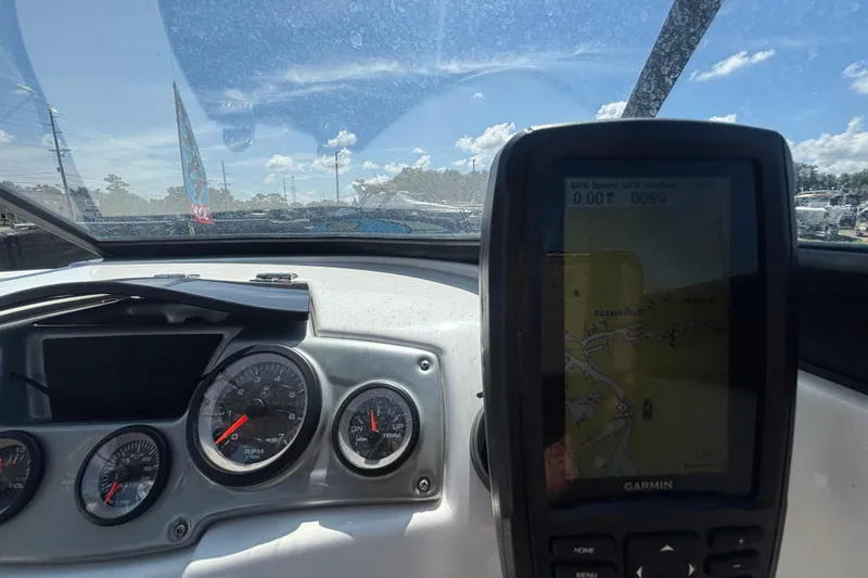 Slide: The Image of Dashboard of a 2019 Tahoe 550 TF boat with GPS and gauges. - 27