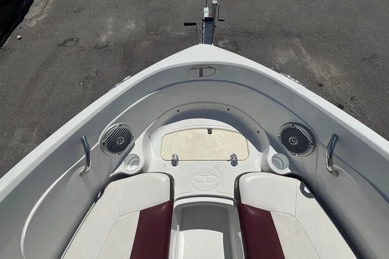 Slide: The Image of The image shows the bow of a boat with two speakers and grab handles. - 34