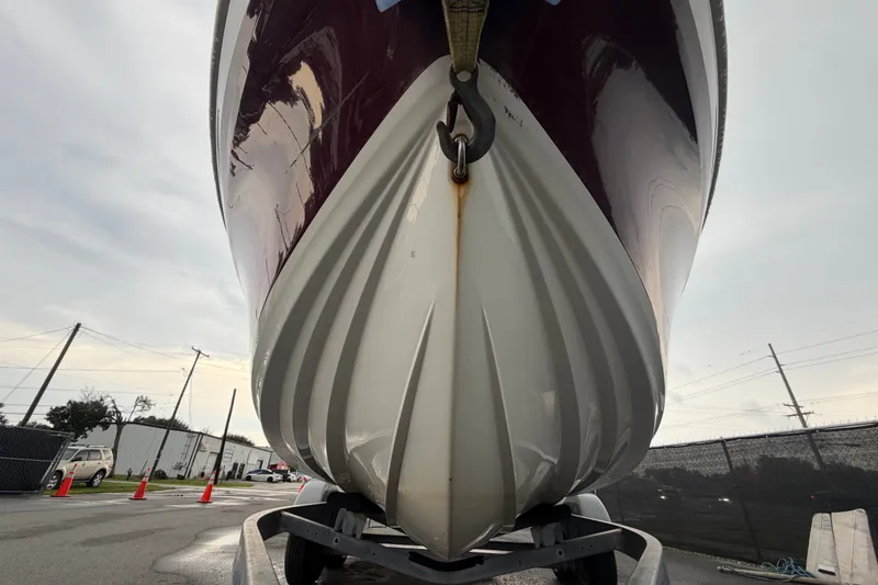 Slide: The Image of 2019 Tahoe 550 TS boat on trailer, viewed from front, showcasing hull design. - 9
