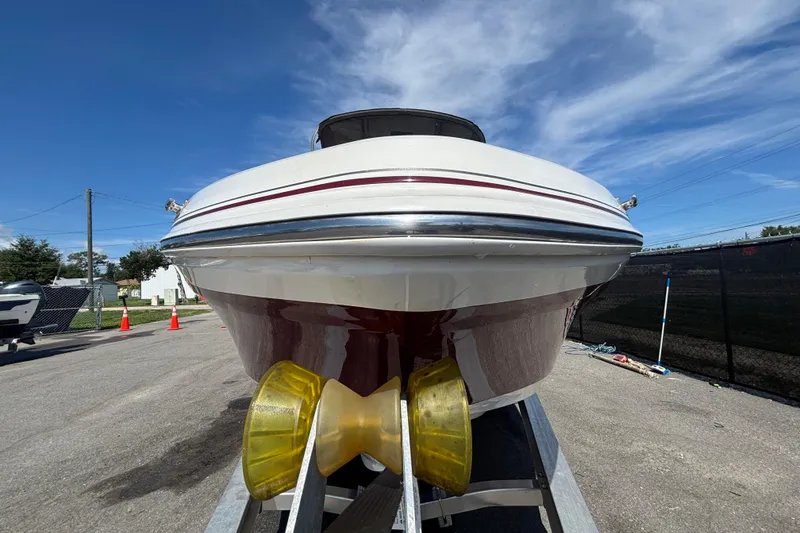 Slide: The Image of 2019 Tahoe 550 TF boat on trailer under clear blue sky. - 10