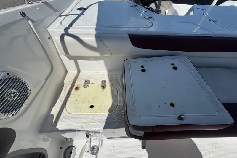 Slide: The Image of 2019 Tahoe 550 TF boat interior with seating and storage compartments. - 51