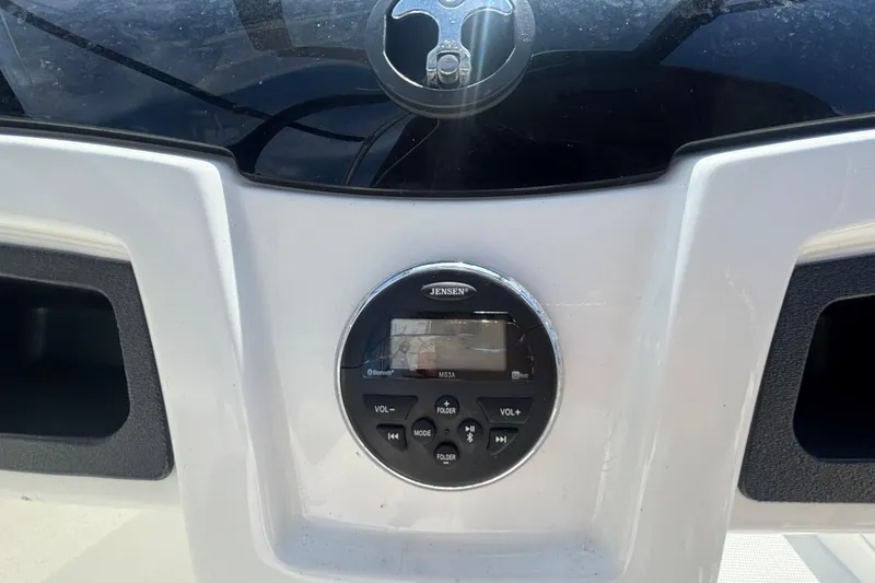 Slide: The Image of Control panel of a 2019 Tahoe 550 TF boat with Jensen audio system. - 22