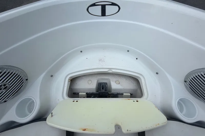 Slide: The Image of Close-up of a white boat's bow with speakers and an open storage compartment. - 36