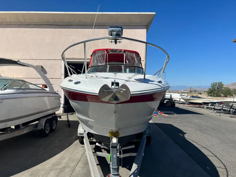 Slide: The Image of 2007 Crownline 250 CR boat on trailer, front view, red and white color scheme. - 4