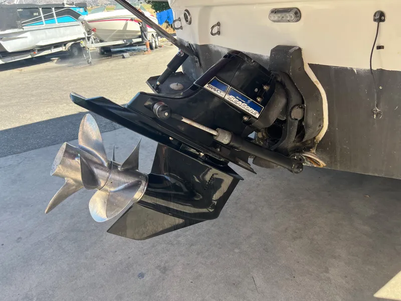 Slide: The Image of 2007 Crownline 250 CR boat stern drive and propeller in a marina. - 7