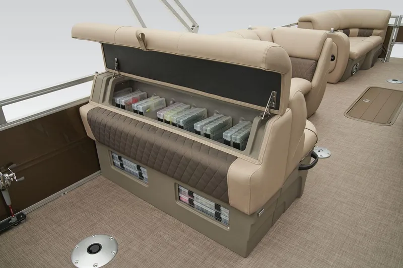 Slide: The Image of 2023 Sun Tracker SportFish 22 XP3 boat interior with storage compartments and seating. - 3