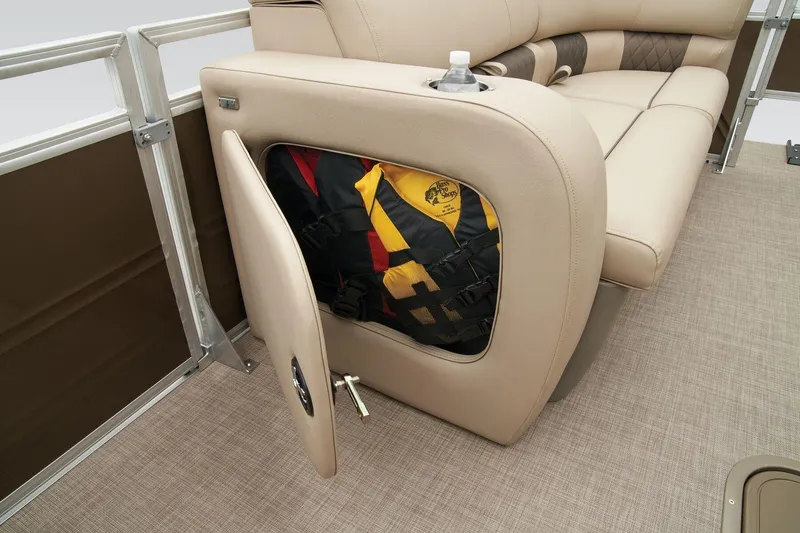 Slide: The Image of 2023 Sun Tracker SportFish 22 XP3 boat seat storage with life jackets. - 8