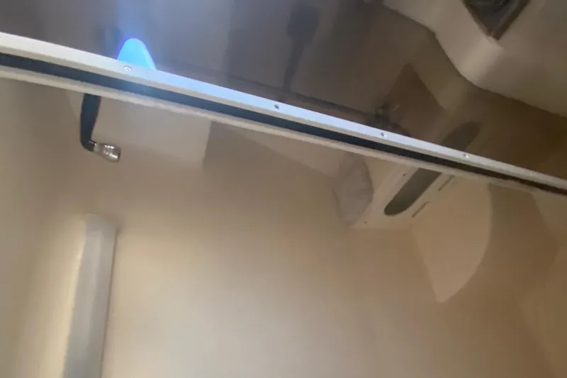 Slide: The Image of 2003 Rinker 342 Fiesta Vee boat interior bathroom with shower. - 10