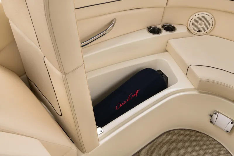 Slide: The Image of 2026 Chris-Craft Launch 28 GT interior with beige seating and storage compartment. - 11