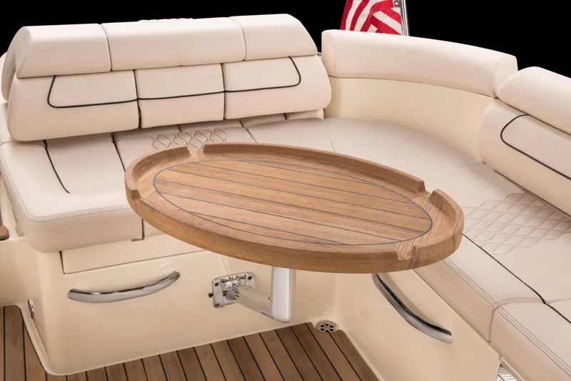 Slide: The Image of Luxurious seating and wooden table on 2026 Chris-Craft Launch 28 GT boat. - 25