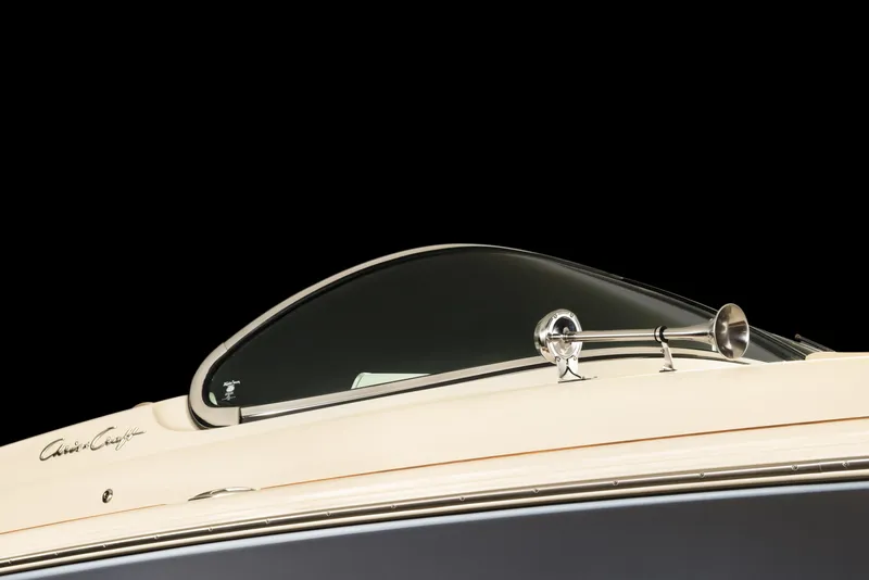 Slide: The Image of 2026 Chris-Craft Launch 28 GT boat with sleek design and chrome details. - 27