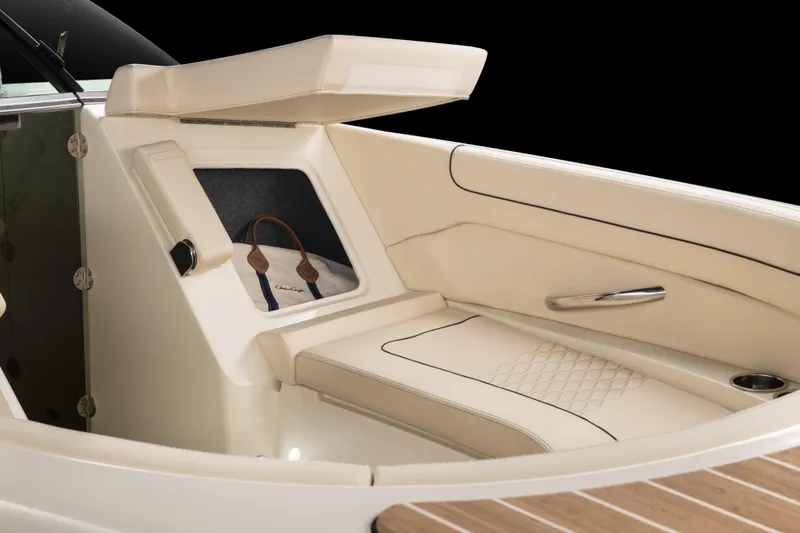 Slide: The Image of 2026 Chris-Craft Launch 28 GT interior with luxurious seating and storage compartment. - 6