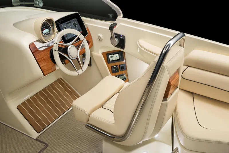 Slide: The Image of Luxurious interior of 2026 Chris-Craft Launch 28 GT boat with elegant steering and controls. - 9