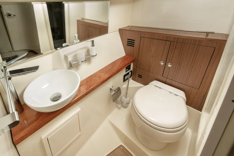 Slide: The Image of Luxurious bathroom in 2026 Chris-Craft Launch 35 GT boat, featuring modern sink and toilet. - 11